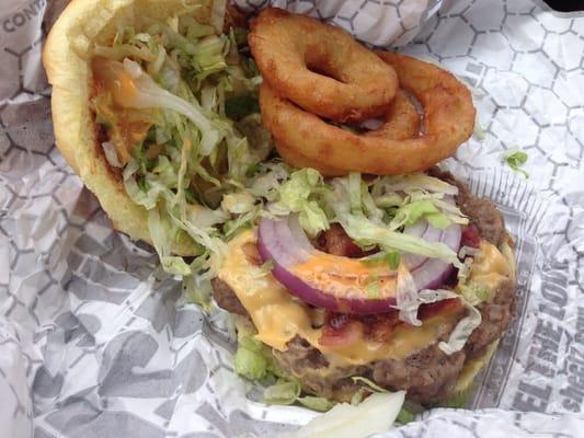 The Boss Bacon burger with onion rings on the side. There are more onion rings. Pretty decent burger, though.