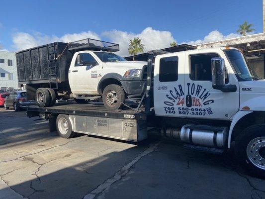 Truck getting dropped off at the shop.