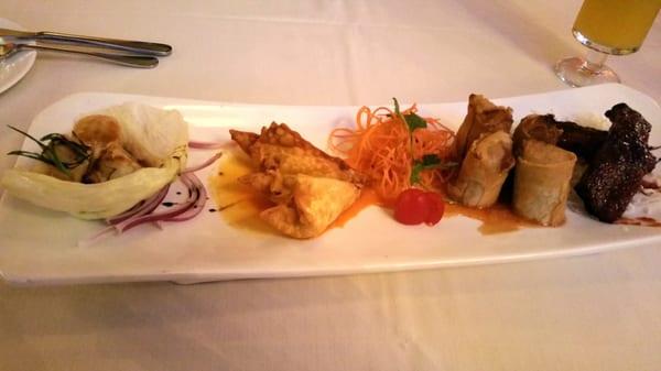 Concerto Dim Sum Sampler: steamed shrimp, crab rangoon, Vietnamese spring rolls, & baby back ribs.