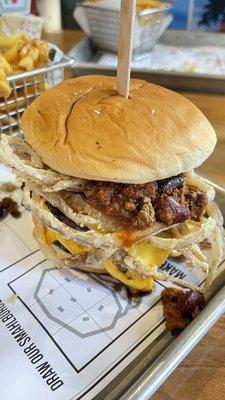 Double cheese burger with chili and onion strings