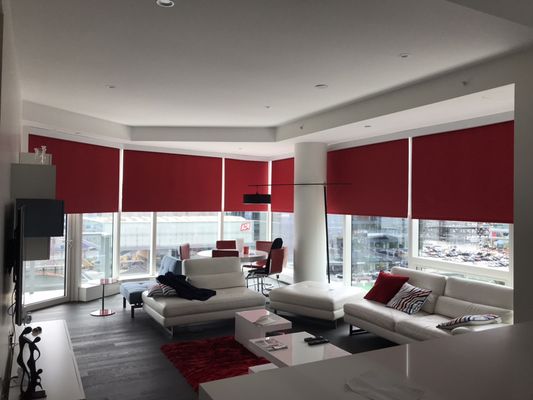 Motorized roller shades