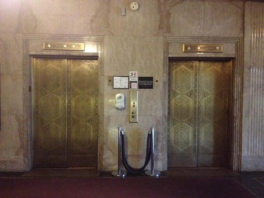 beautiful albert kahn elevators in the lobby