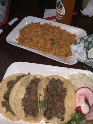 Three fajita tacos and a side of rice