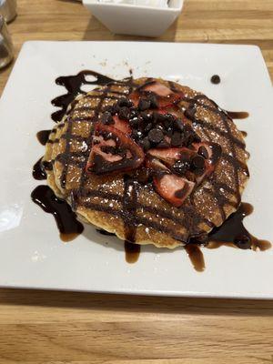 Chocolate pancakes with strawberries