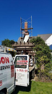 The top of the chimney was loose we repaired it