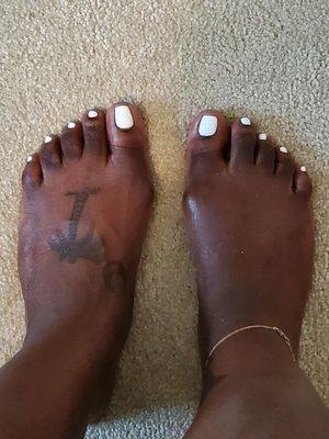 All white pedicure. Good polish