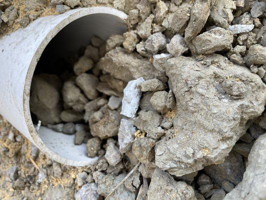 Rocks and debris in our drainage piping