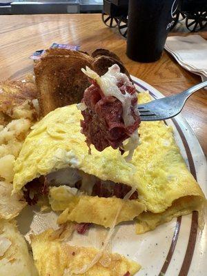 That's actually a pretty nice chunk of corn beef in my Reuben omelette.  There were more where that came from.