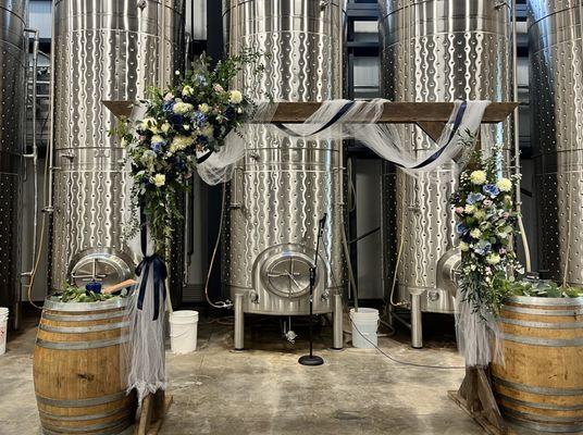 Wedding alter with cider silos in the background made for great photos!