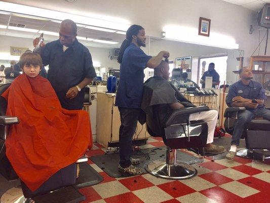 Flash getting his back to school cut.  He hates getting his haircut and the barber was very patient with him!