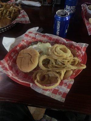 cajun grilled tenderloin with sautéed mushrooms and onions  battered onion rings on the side