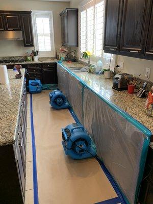 Flooded Kitchen Cabinets