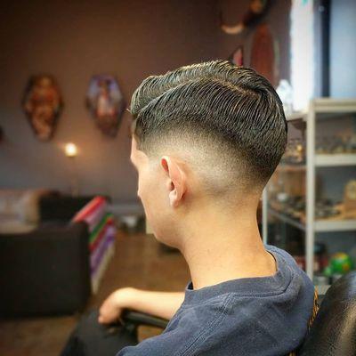 Mid drop razor fade done by Brian