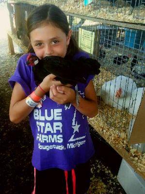 Cassidy supporting Blue Star Farms at the local fair.  Thank you Cassidy! :)