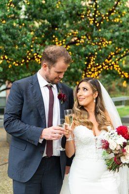 The twinkle-lit tree makes for beautiful wedding photos at this Irvine, CA venue