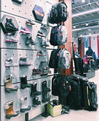 Shoes and backpacks on display