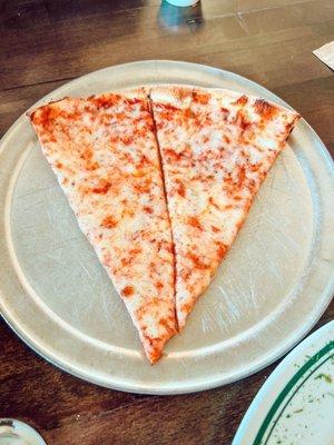 Single slice of pizza cut in half for lunch special