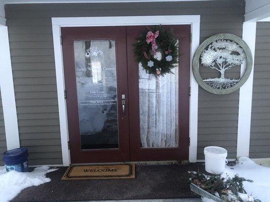 Business name on door just under wreath