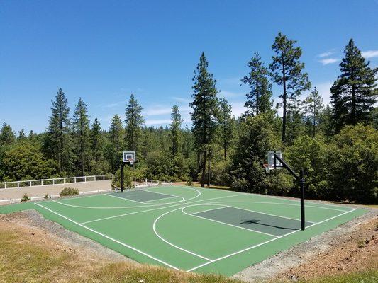 J&S Asphalt re-surfacing our basketball court in May 2017 -- beautiful colors daylight view