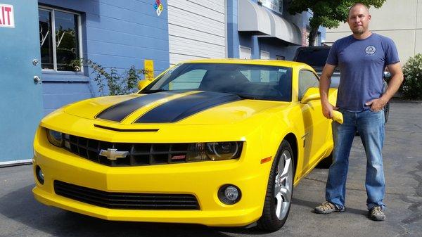 Jimmy posing next to my car after he repaired it.