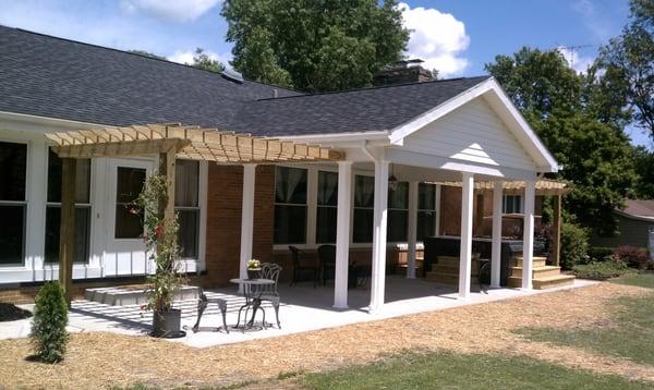 Covered concrete patio (pavilion area) with two pergolas built in Ravenna, Ohio.