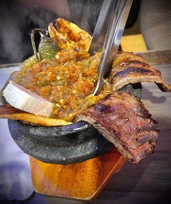 Molcajete for one! But it's can feed two! It's such a large portion! Don't let the picture fool you! The sauce is to die for!