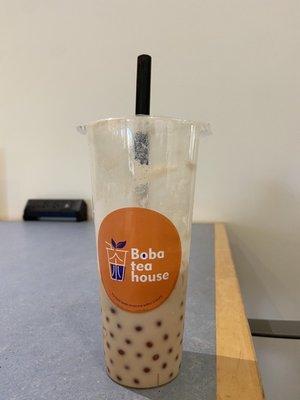 (large) coffee milk tea with peach popping bubbles  (this photo wasn't taken in the actual shop)