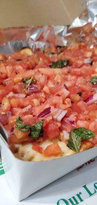 Closeup of the delicious Bruschetta Pizza.