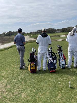 Our caddy Bobby assisting with club selection.