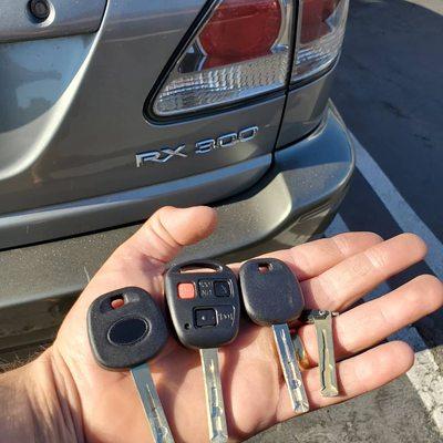 Repaired and programmed Lexus remote head key