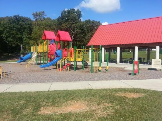 Kids Playground recommended ages 5-12. Covered picnic tables, open grills.