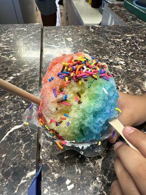 Rainbow shaved ice with sprinkles