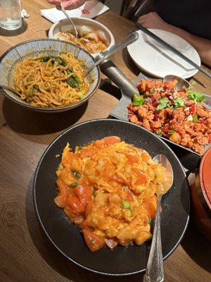 Dan Dan Noodles, Red Oil Dumplings, Spicy and Crispy Chicken, Egg and Tomato Fish Cubes