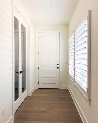 Plantation shutters, mirage rear tilt rod, sandbrushed finish.