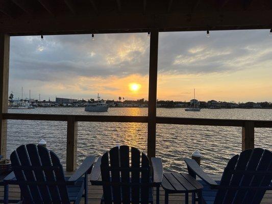 My view as the sun set. I count 15 chairs out here (and a spacious setup inside). Plenty of room to enjoy either with some folks or alone.