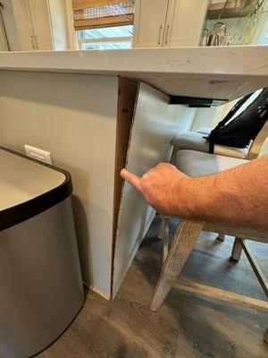 veneer of cabinet not fastened and cut wrong