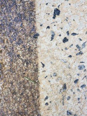 Vivid contrast between washed and unwashed driveway, highlighting the impact of our pressure washing expertise