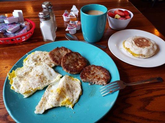 Eggs  sausage  patties fruit  cup English  muffin