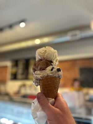 Triple in a waffle cone - cookies & cream, chocolate (was the best), and topped with vanilla bean (bland and uninspiring)