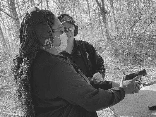 One of our NRA instructors teaching at the range.