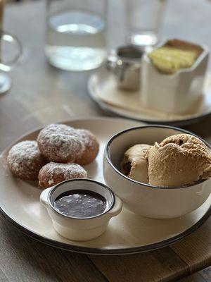 The powder coated doughnuts were smoking hot. Fresh out of the fryer|oven. Eat with care as they are hot....wouldn't have it any other way.