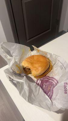 The double cheeseburger I received, with a bite taken out.