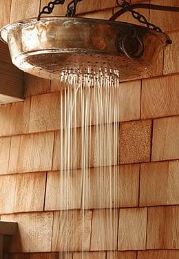 Cold water shower in the sauna.