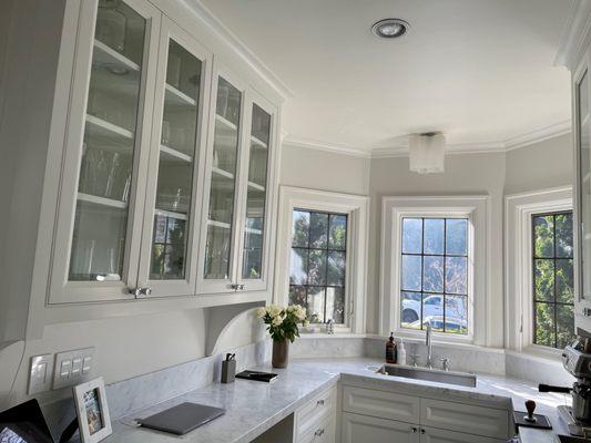 Kitchen cabinets refinishing and painting.