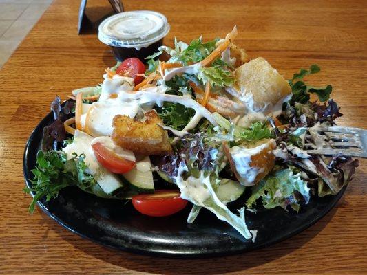 A salad NOT made with iceberg lettuce as advertised.