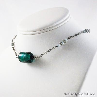 Green Floral Lampwork Glass Bead Necklace with Handmade Niobium Chain, Blue Topaz Accents. $85.00