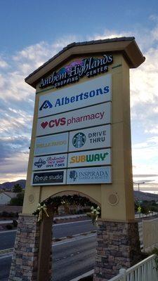 The shopping center sign and some businesses at the southernmost shopping center in Henderson.