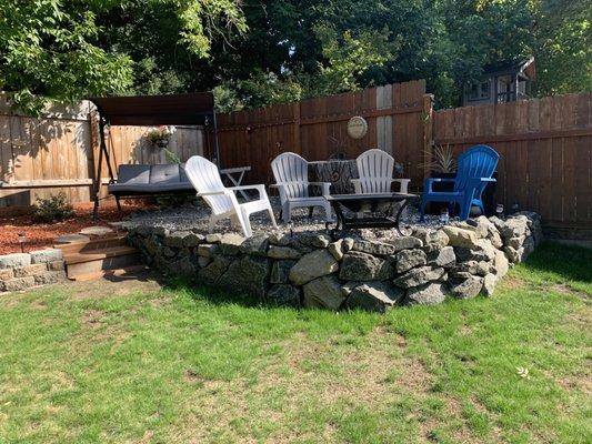 Rock wall fire pit area. Got-r-done!