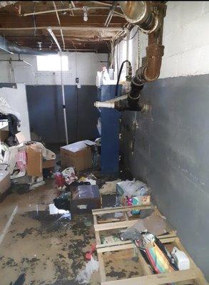 Trashed and wet basement. Our washer and dryer are missing. Sump pump couldn't run because power was cut off.