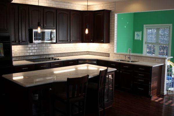 My kitchen with Granite Vision Ashbun.  The one light above the cabinets was turned off for the picture - it's not a problem.